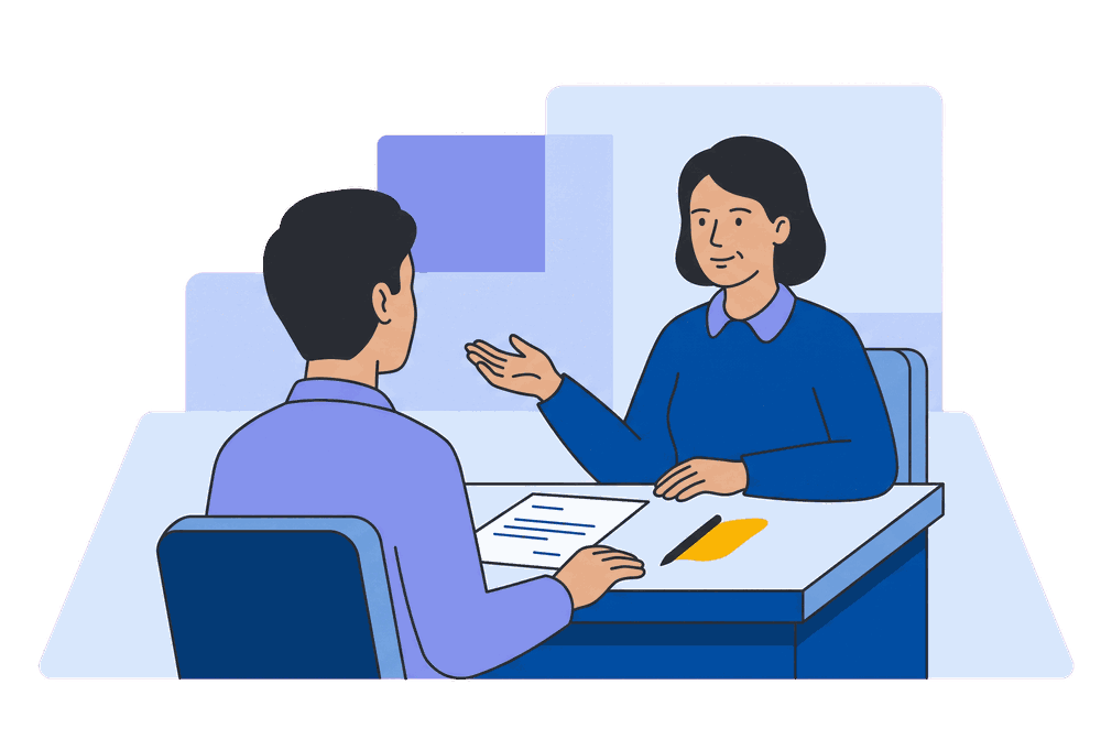 A woman in her forties talking things through with an adviser across a desk