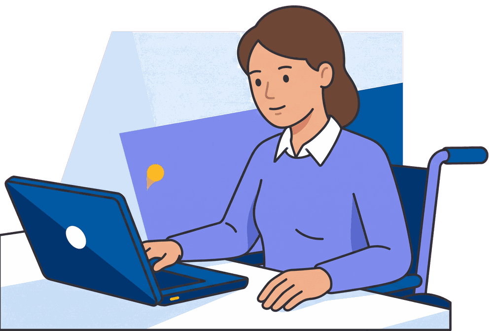 A woman working at her laptop, seated in her wheelchair
